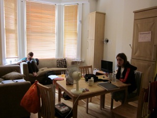 The living room of my London Apartment and two of my roommates.